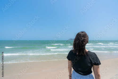 Young girl on Beautiful Tropical Beach PP Island, Krabi, Phuket, Thailand blue ocean background Woman items vacation accessories for holiday or long weekend a guide  choice idea for planning travel