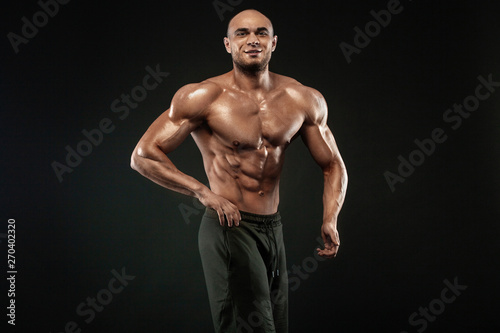 Bodybuilding competitions on the scene. Man sportsmen bodybuilder physique and athlete. Fitness motivation.