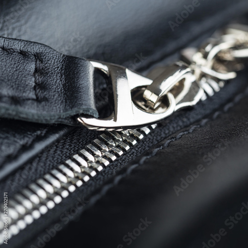 Close-up of leather products zipper opening. Leather goods.