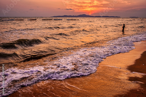 Dongtan Beach, near Pattaya, in Thailand, at sunset photo