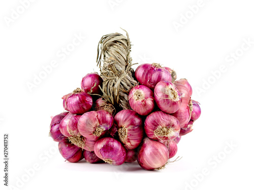 The colorful fresh shallot on the white bagkground