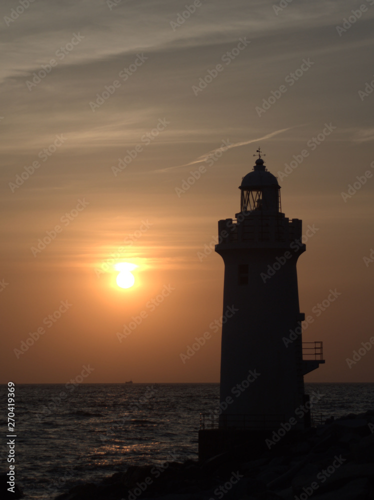 lighthouse at sunset