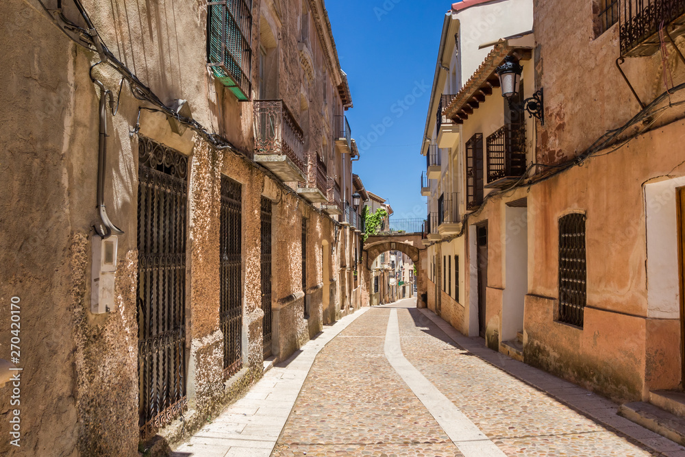 Old cobblestoned street in historic town Alcaraz, Spain