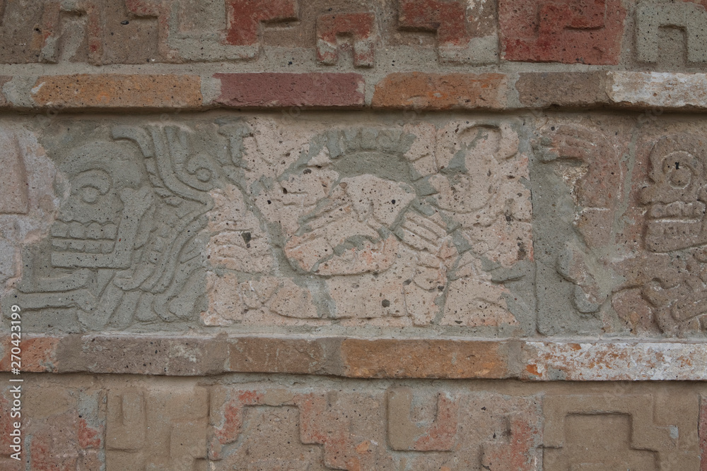 Ancient Mayan stone carvings on the pyramids at The Ancient City of Tula, Mexico