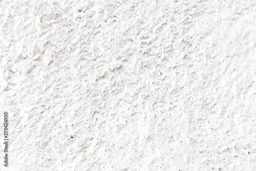 White wall of sand and concrete as an abstract background