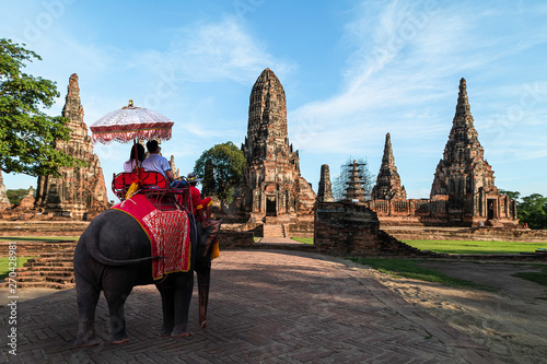 Foreign tourists Elephant ride to visit Ayutthaya, There are ruins and templesi in the Ayutthaya period.Concept is Travel in temple Chaiwatthanaram. © Suppasit