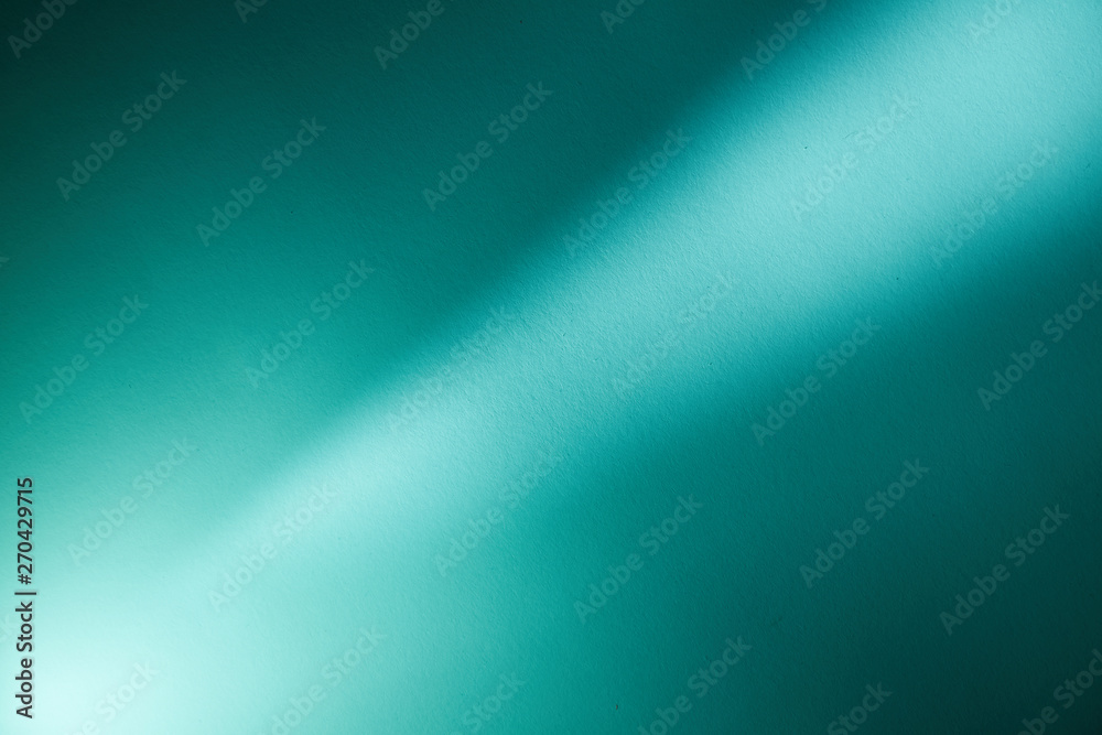 Bright beam of light on a dark background from the lower left corner to the upper right corner Bright beam of light on a dark background from the lower left corner to the upper right corner