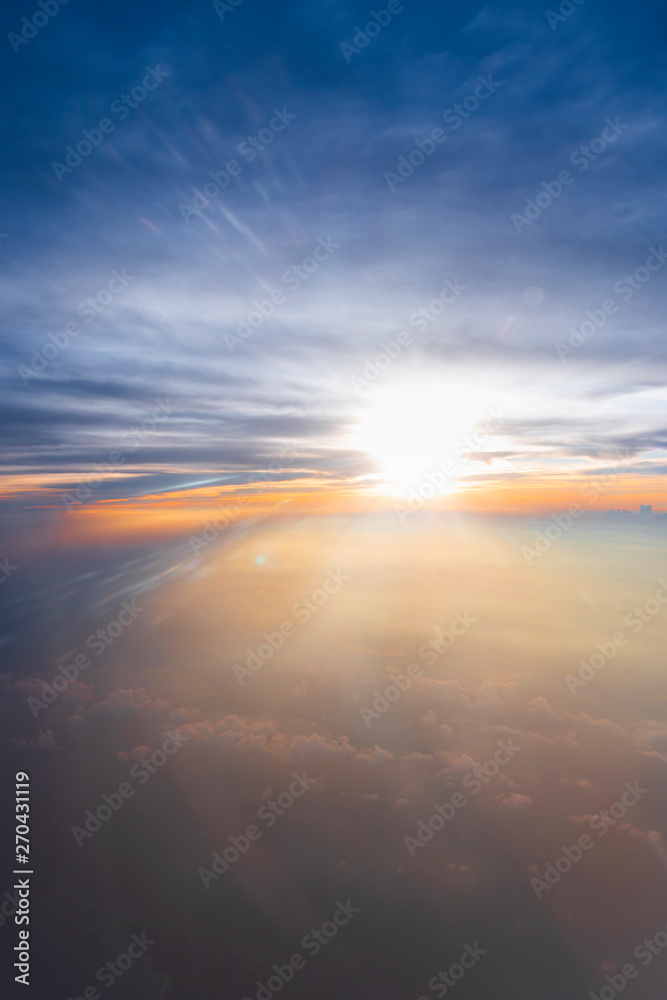 clouds sky skyscape in sunset time. view from the window of an airplane flying in the clouds, top view clouds like  the sea of clouds sky background