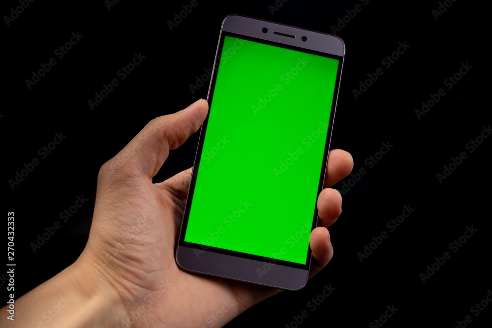 hand holding smart phone with blank screen isolated on white hand holding smart phone with blank screen isolated on white