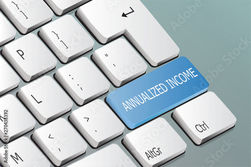 annualized income written on the keyboard button photo