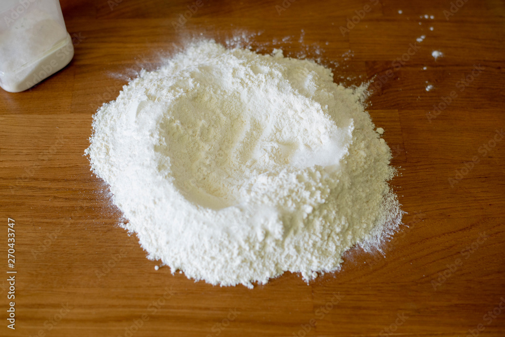 Flour on a wooden table