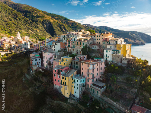 Aerial view of Corniglia, nestled in the middle of the five centuries-old villages of Cinque Terre, Italian Riviera, Liguria, Italy.