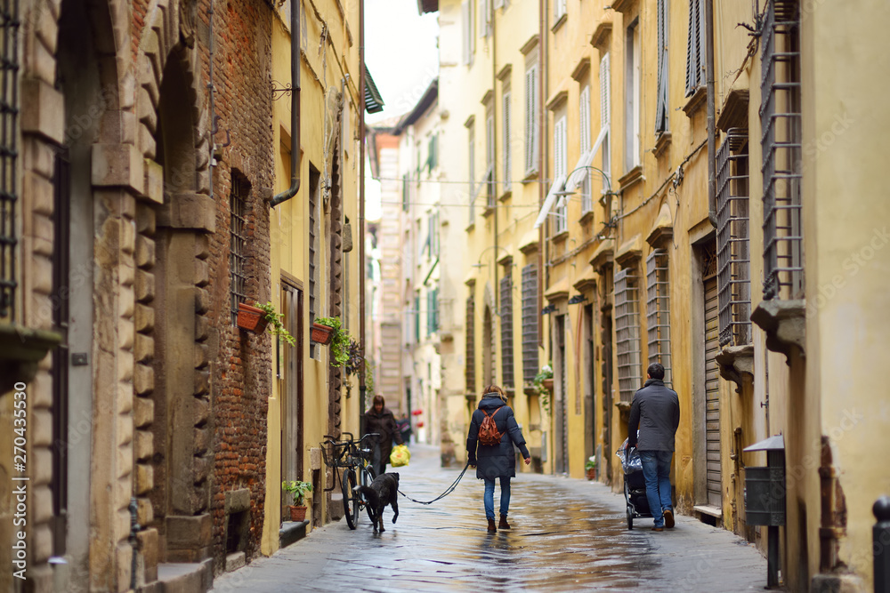Beautiful medieval streets of Lucca city, Tuscany, Italy.