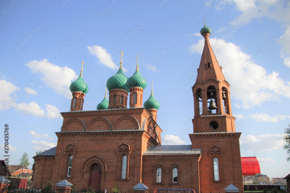 Landscape overlooking the church in the village of Komsomolskoye , Russia