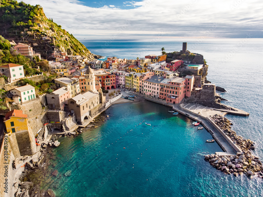 Aerial view of Vernazza, one of the five centuries-old villages of Cinque Terre, located on rugged northwest coast of Italian Riviera.