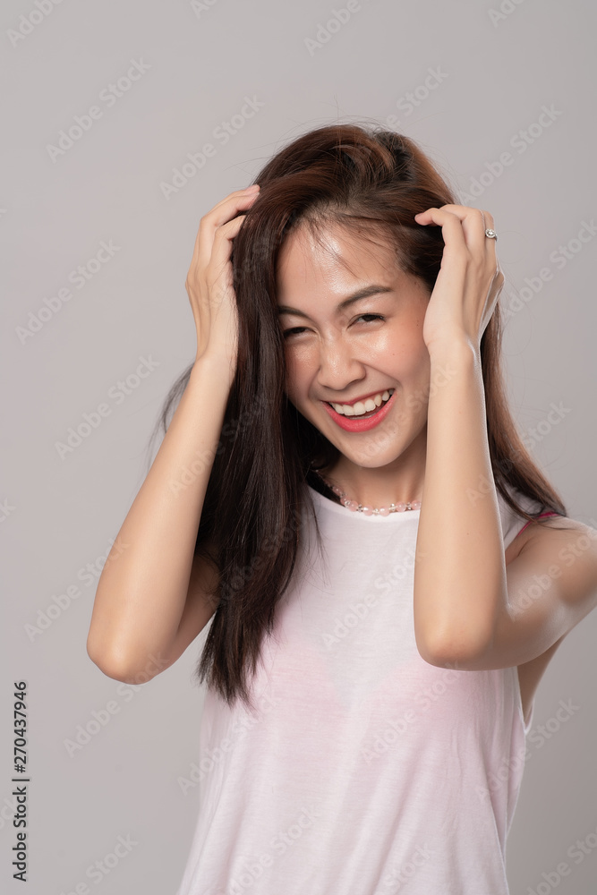 Happy cheerful young asian woman in bun rejoicing at positive news or receive birthday gift, beautiful female looking at camera with joyful and smile on white background. Happy cheerful young asian woman in bun rejoicing at positive news or receive birthday gift, beautiful female looking at camera with joyful and smile on white background.