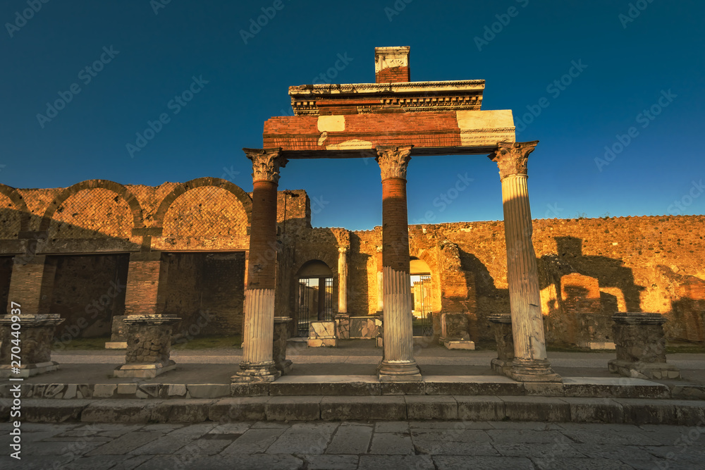 Pompeii, ancient roman city against Vesuvius volcano, Italy