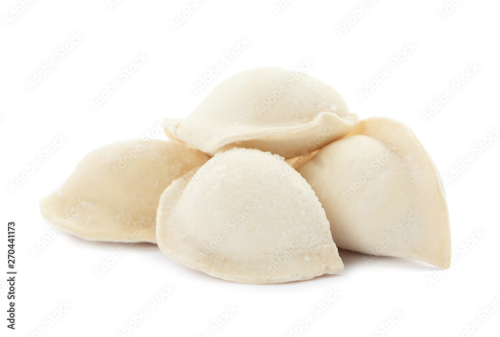 Heap of raw dumplings on white background