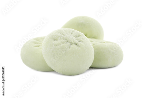 Heap of raw dumplings with tasty filling on white background