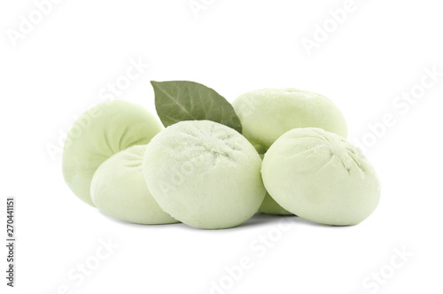 Raw dumplings with bay leaf on white background