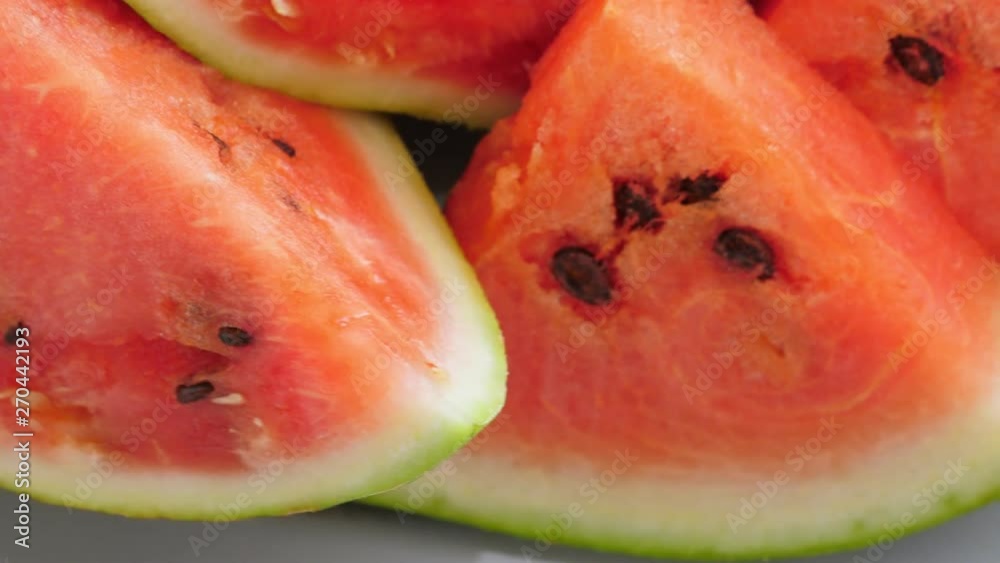 Ripe red watermelon rotate. Closeup Ripe red watermelon rotate. Closeup