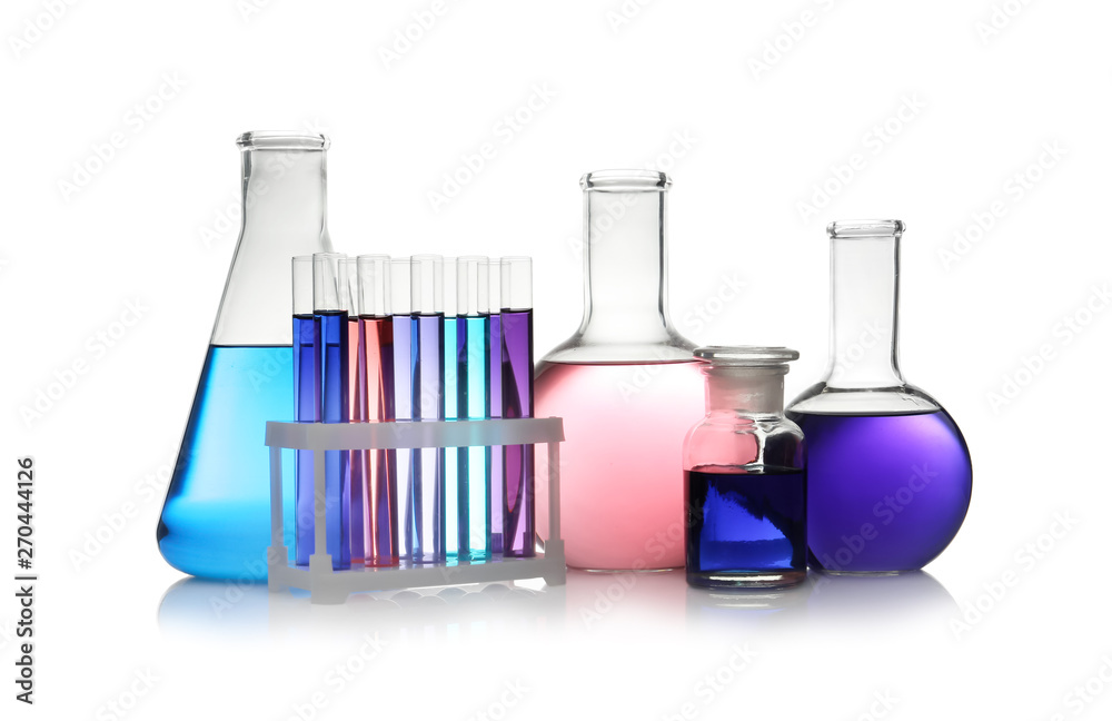 Set of different lab glassware with color liquid isolated on white Set of different lab glassware with color liquid isolated on white