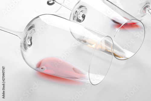 Glasses with different wine on white background, closeup