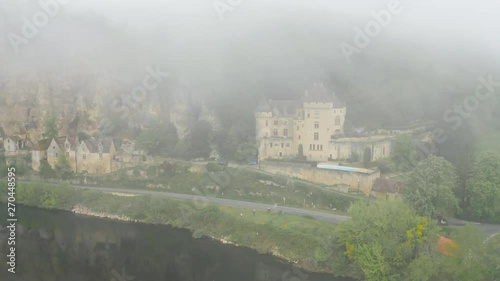 Aerial panorama of Castle Malartrie. Castle transformed from a mansion to a manor castle (château). La Roque-Gageac, Dordogne Valley, France. photo