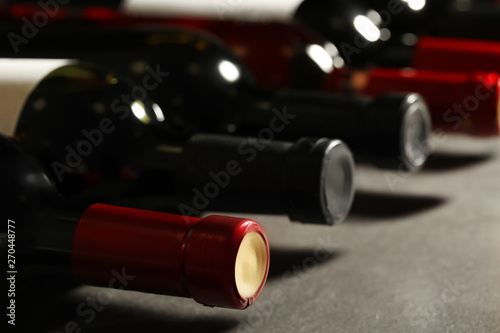 Bottles of different wines, closeup. Expensive collection © New Africa