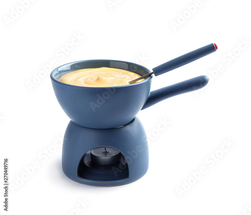 Pot with delicious cheese fondue and fork on white background