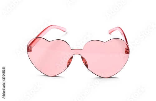 Stylish heart shaped glasses on white background