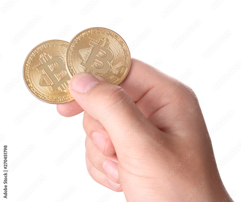 Man holding golden bitcoins on white background, closeup Man holding golden bitcoins on white background, closeup