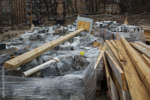 Stacks of paving slab, building materials for the reconstruction of the pavement