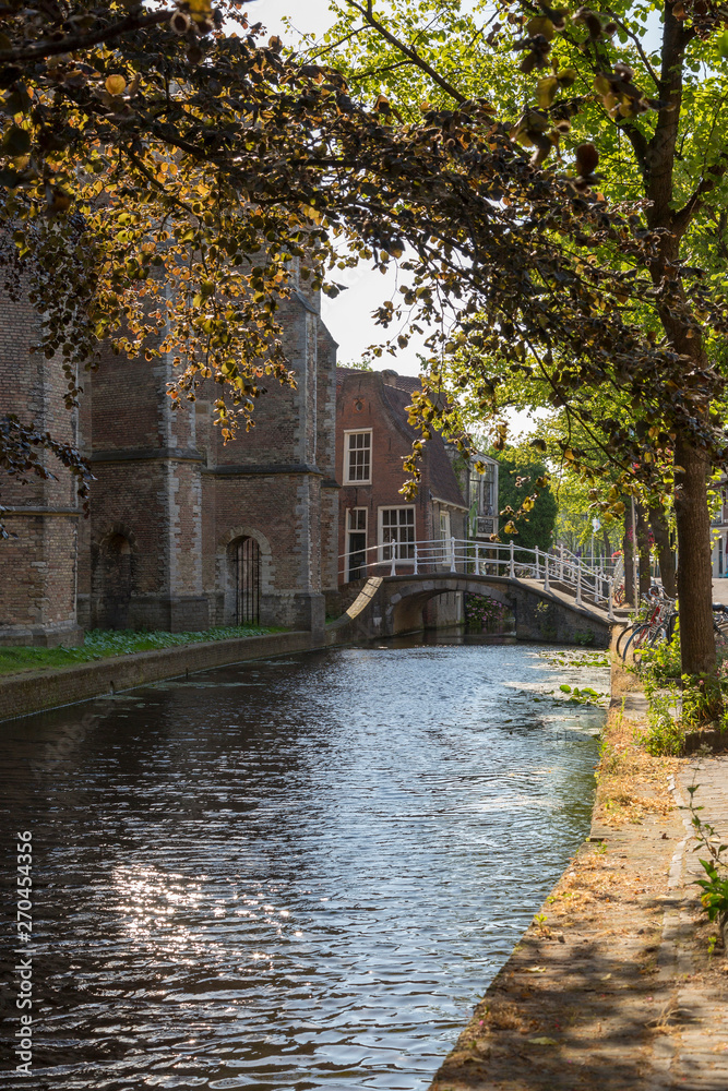 Delft, Netherlands - July 03, 2018: View to the street in the historic center of Delft