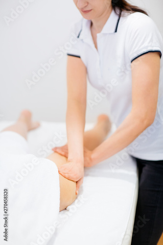 Woman having a massage in a medical center 