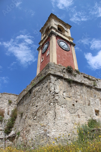Old Historic Building Clock tower And Church With Stone Walls In Corfu Greece