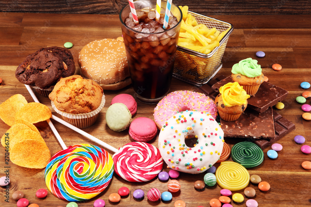 Unhealthy products with sugar. food bad for figure, skin, heart and teeth.