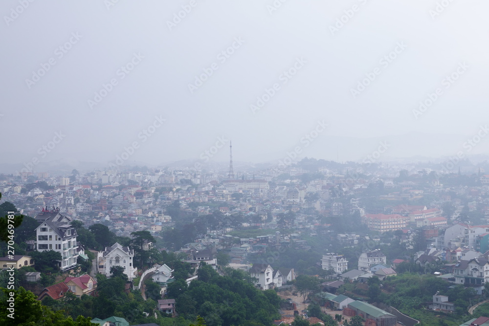 Dalat, Vietnam - May 2019. Dalat city view in the fog