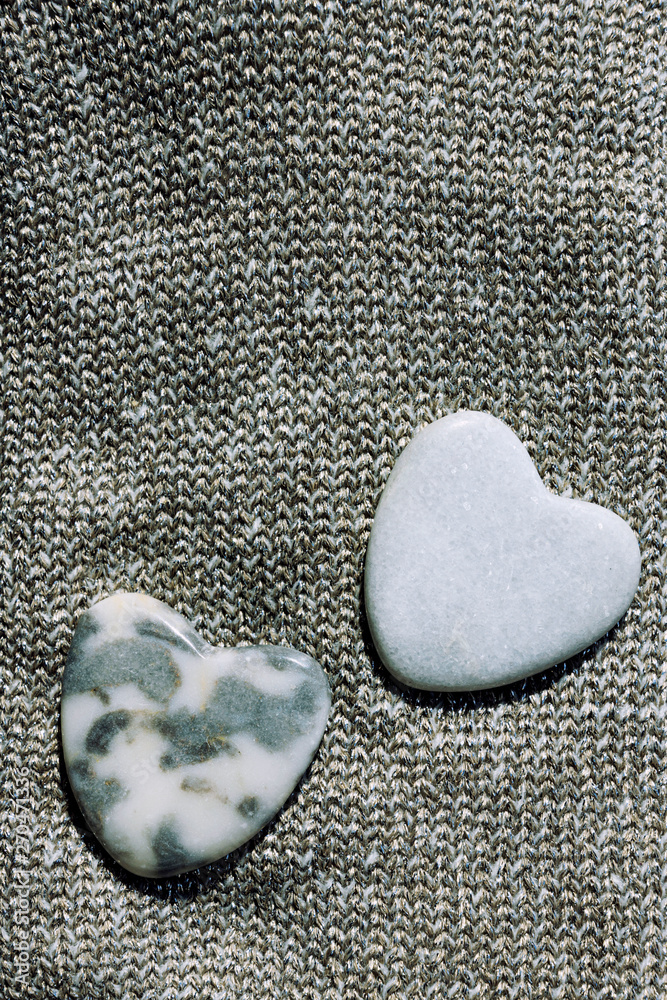 Obraz premium Hearts on fabric texture background