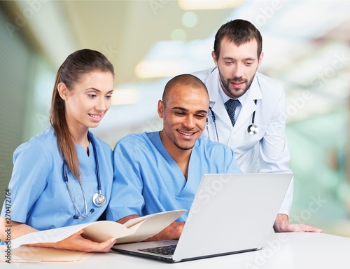 Close-up of a Smiling Nurse / Doctor Standing in an Operating Room