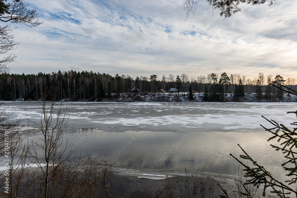 frozen river in winter countryside