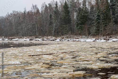 frozen river in winter countryside