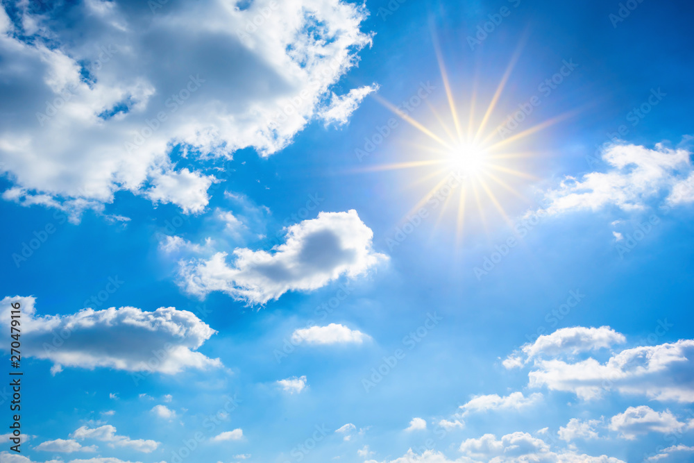 Sunny background, blue sky with white clouds and sun