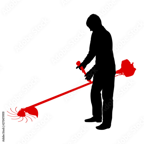 Silhouette worker of a garden cuts off grass.