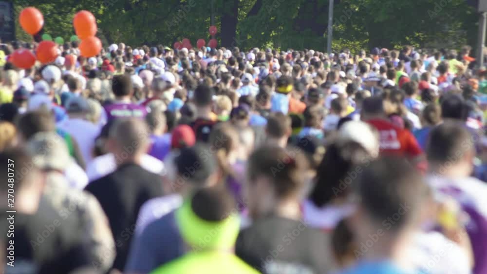 4K - Back view of marathon crowd