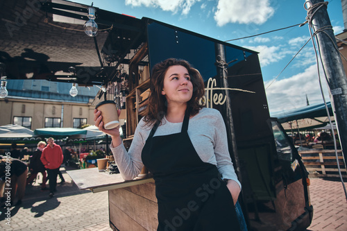 Pretty young barista has a ...