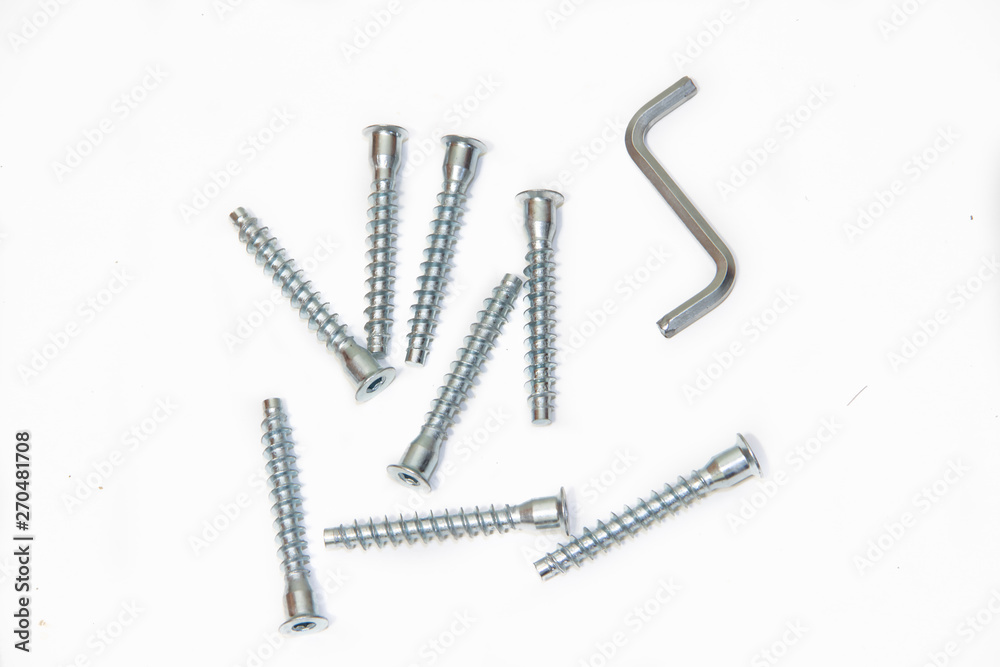 Screws isolated on white background. Accessories on a white background. Screws isolated on white background. Accessories on a white background.