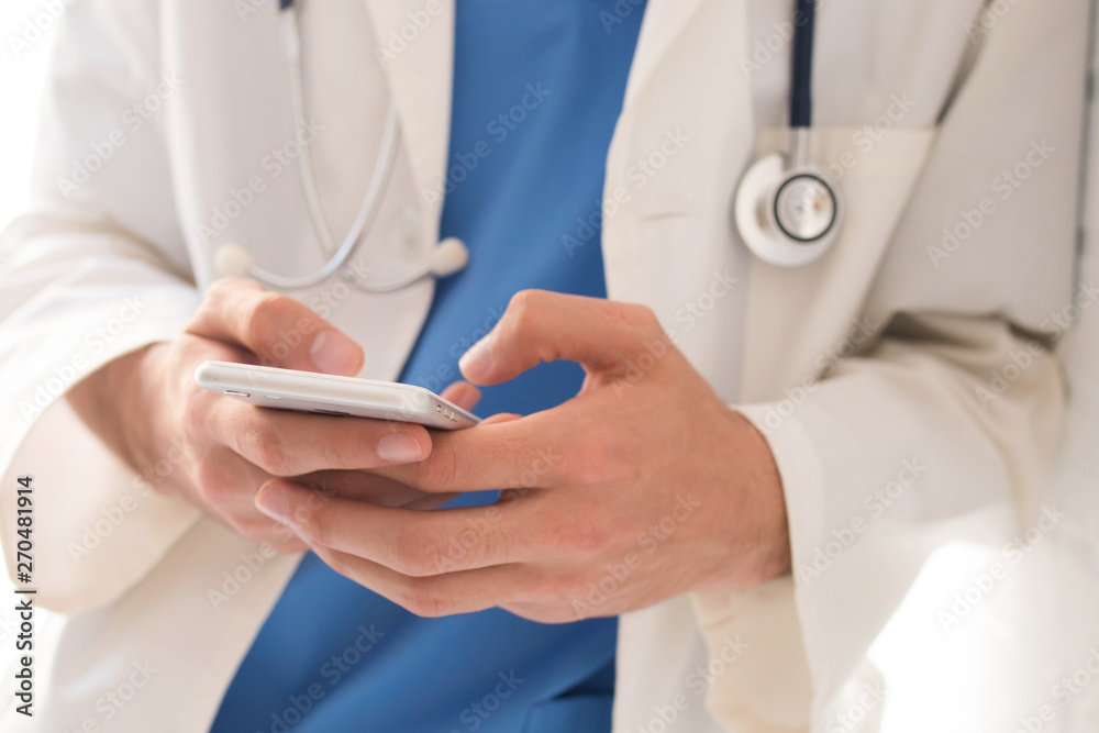 doctor with mobile phone or smartphone doctor with mobile phone or smartphone