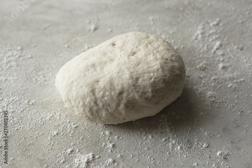 rolled dough for making homemade bread in the oven