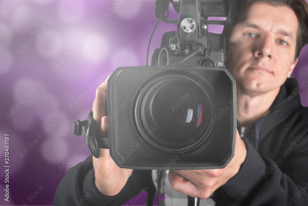 Cameraman working with camera on background Cameraman working with camera on background